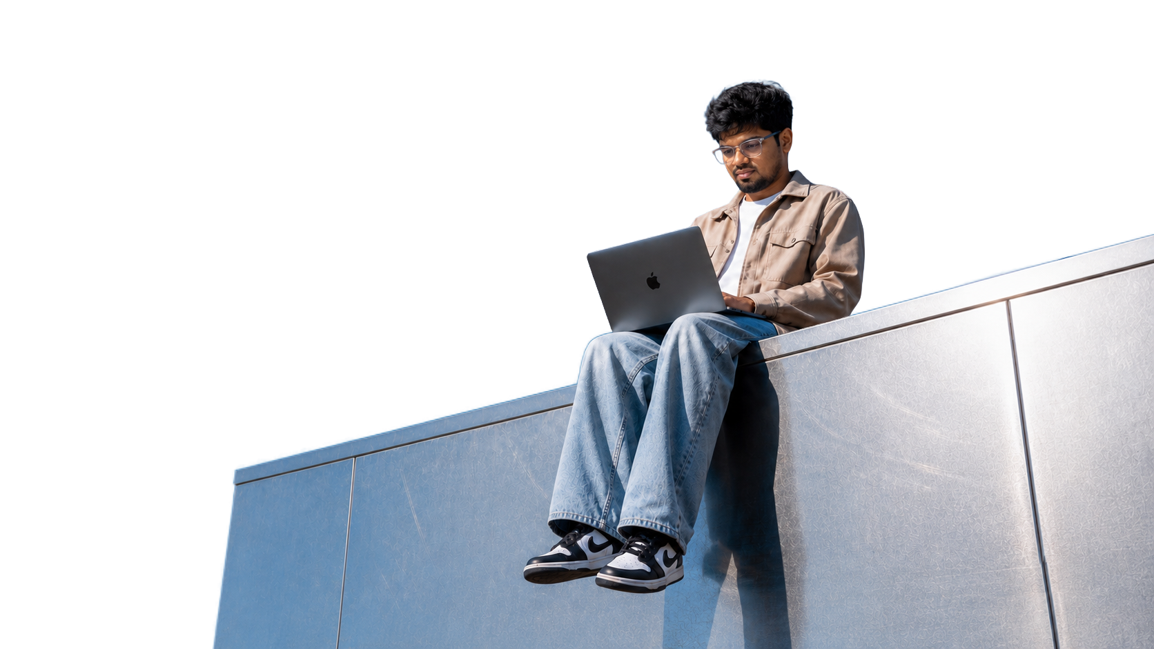 Designer sitting with laptop